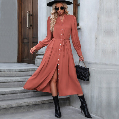 Hot selling European and American fashion women's long sleeved solid color versatile dress in spring and autumn